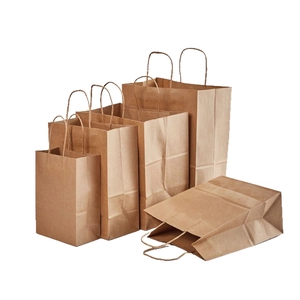 Eco-friendly brown kraft paper bags with handles in various sizes for shopping and gifts