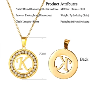 Gold stainless steel necklace with round rhinestone paved pendant featuring letter K