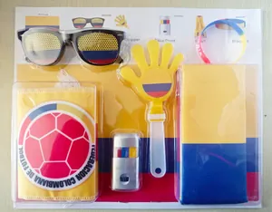 Detail view of Colombia soccer fan kit including sunglasses and scarf in blister packaging