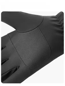 Macro detail of waterproof ski glove palm with non-slip grid texture for enhanced grip