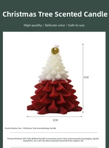 Detail view of a dual-tone Christmas tree scented candle with gold bell and 9x8cm dimensions