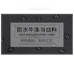 Close-up of waterproof black oxford fabric showing durable texture and water droplets
