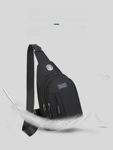 Close-up of lightweight black oxford chest bag featuring multi-layer zipper compartments
