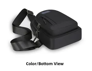 Bottom view of black nylon chest bag showing thick profile and Oxford cloth texture