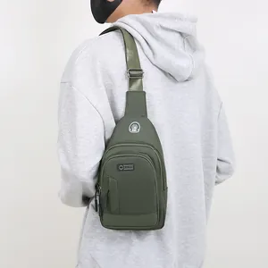Army green waterproof Oxford fabric chest bag for outdoor sports with earphone port