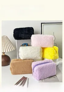 Set of six colorful plush makeup bags with soft faux fur texture and metal zippers