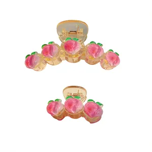 Pink peach decorative large and small hair clips with green leaves and metal spring