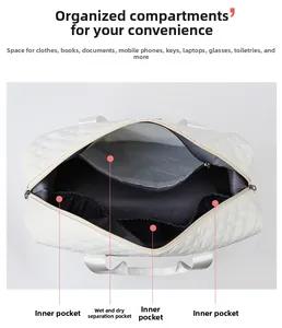 Detailed interior of quilted travel bag showing wet and dry compartments and pockets