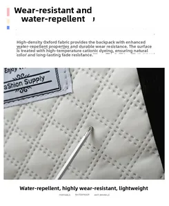 Close-up of water-resistant oxford fabric showing scratch resistance on white yoga bag