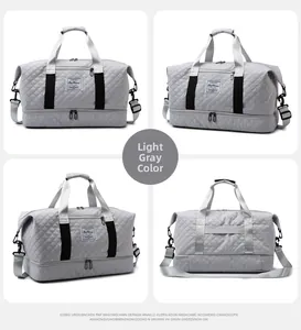 Detail view of light grey quilted travel bag featuring multi-compartment design