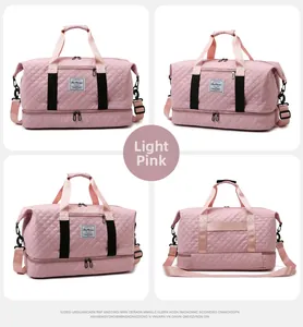 Detail view of pink quilted travel bag showing dry wet separation and bottom compartment