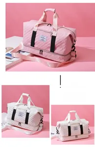 Detail of quilted gym bag showing dry-wet separation bottom compartment and large capacity
