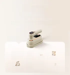 Handheld garment steamer detail showing digital display and versatile 7-in-1 functions