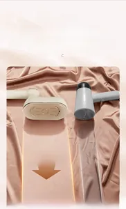 Detail of handheld garment steamer with ceramic coated aluminum plate and steam vents