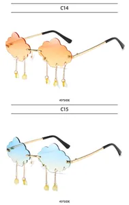 Close-up of cloud-shaped rimless sunglasses with gradient lenses and raindrop charms