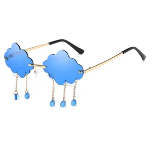 Cloud-shaped rimless sunglasses in sky blue with gold metal frames and rain drop tassels
