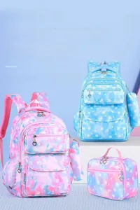 Close-up of waterproof gradient star pattern school bag set with heart zipper pulls