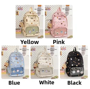 Collage of five colorful school backpacks with transparent badge pockets and plush charms