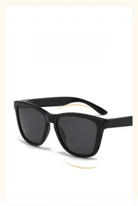 Detail view of lightweight black oversized polarized sunglasses with sleek resin frames