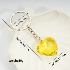 Bright yellow acrylic heart faceted keychain pendant with silver metal ring and 10g weight