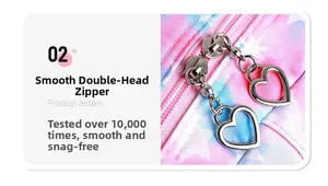 Detail of durable dual metal heart-shaped zippers on gradient star backpack