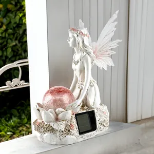 Garden flower fairy solar light ornament with pink crackle glass ball and resin wings