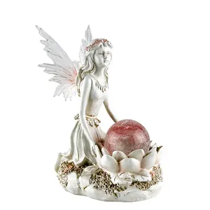Solar flower fairy garden statue with glowing crackle glass ball for outdoor ornament
