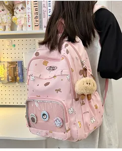 Pink school backpack with clear PVC window and cute cartoon bear patterns and charms