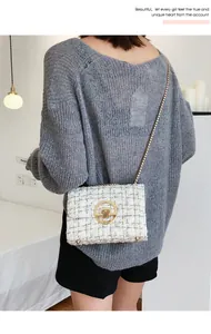Elegant white tweed shoulder bag with golden chain and metallic ring buckle detail