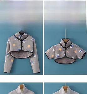 Close-up of thickened flannel shoulder warmer with astronaut patterns and button closure