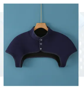 Close-up of thick thermal shoulder warmer with high neck collar and three-button closure