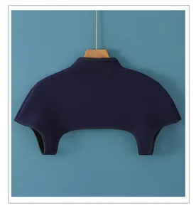 Close-up of thick thermal shoulder wrap in deep purple on a wooden hanger for winter