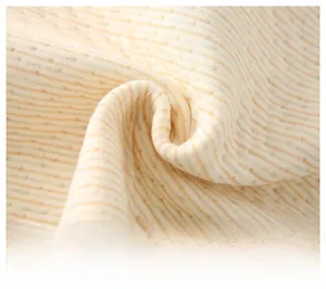 Macro detail of breathable striped colored cotton fabric for thermal shoulder protector