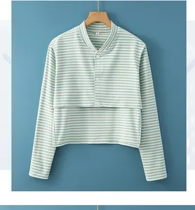 Detailed view of green striped thermal cardigan with buttons and L-size label