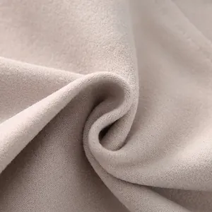 Soft thermal beige shoulder protector wrap in plush fabric for neck warmth and comfort