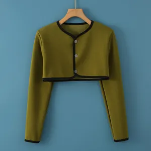 Olive green warm shoulder wrap with soft fleece lining and three button closure