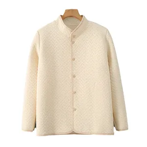 Quilted off-white thermal homewear jacket with waffle texture and buttons on hanger