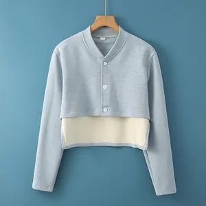 Light blue thermal shoulder protector with buttons and stylish layered hem design