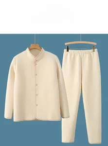 Macro view of cream thermal lounge set with textured honeycomb knit and button details