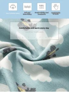 Detailed view of light blue cotton fabric with clouds and giraffe patterns for shoulder wrap