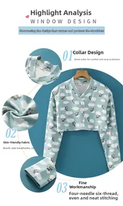Detail of thin cotton shoulder shrug showing standing collar and cloud bear pattern