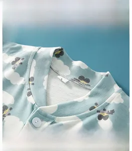 Macro view of stand-up collar with soft knitted cotton texture and bee cloud patterns