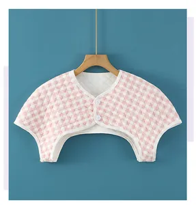 Pink and white checkered quilted cotton shoulder warmer with two white button closure