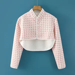 Pink checkered quilted shoulder cape with diamond stitching and white buttons