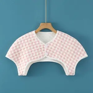 Quilted thermal cotton shoulder protector with pink plaid pattern and button closure