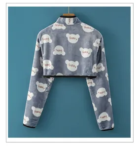 Detail of warm flannel shoulder protector with cute white bear and Happy print pattern