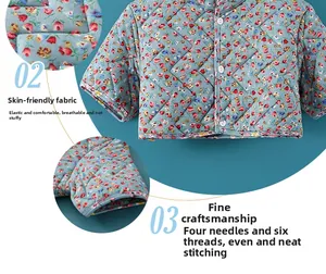 Detail view of skin-friendly quilted fabric with floral pattern and secure button closure