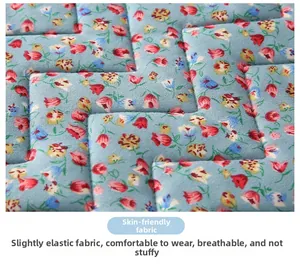 Close-up of floral quilted fabric showing breathable, skin-friendly and elastic texture