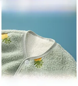 Detail view of baby shoulder protector with soft flannel and warm pineapple print
