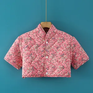 Pink floral quilted shoulder warmer vest with diamond stitching and high collar for women